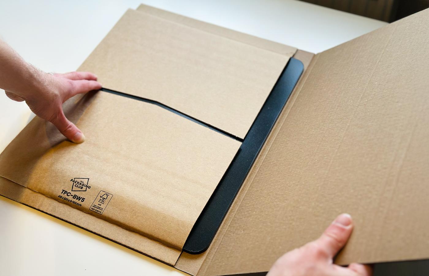 Crust King pizza baking tray, packed in a BW5 book wrap