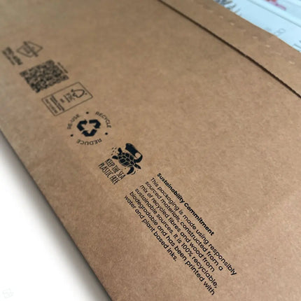 Close-up of a brown cardboard A194 envelope with sustainability information printed on it. Manufactured from high quality E-flute corrugated cardboard