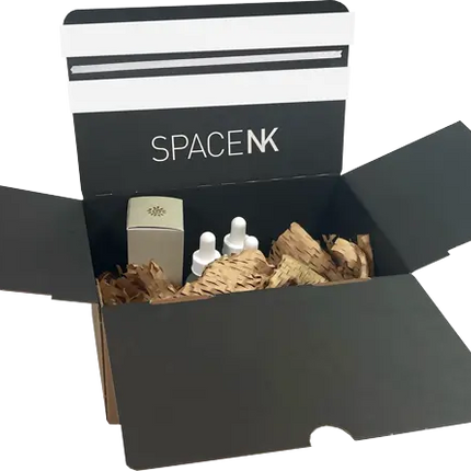 Space NK e-commerce packaging custom printed crash lock boxes